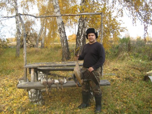 С трофеями.