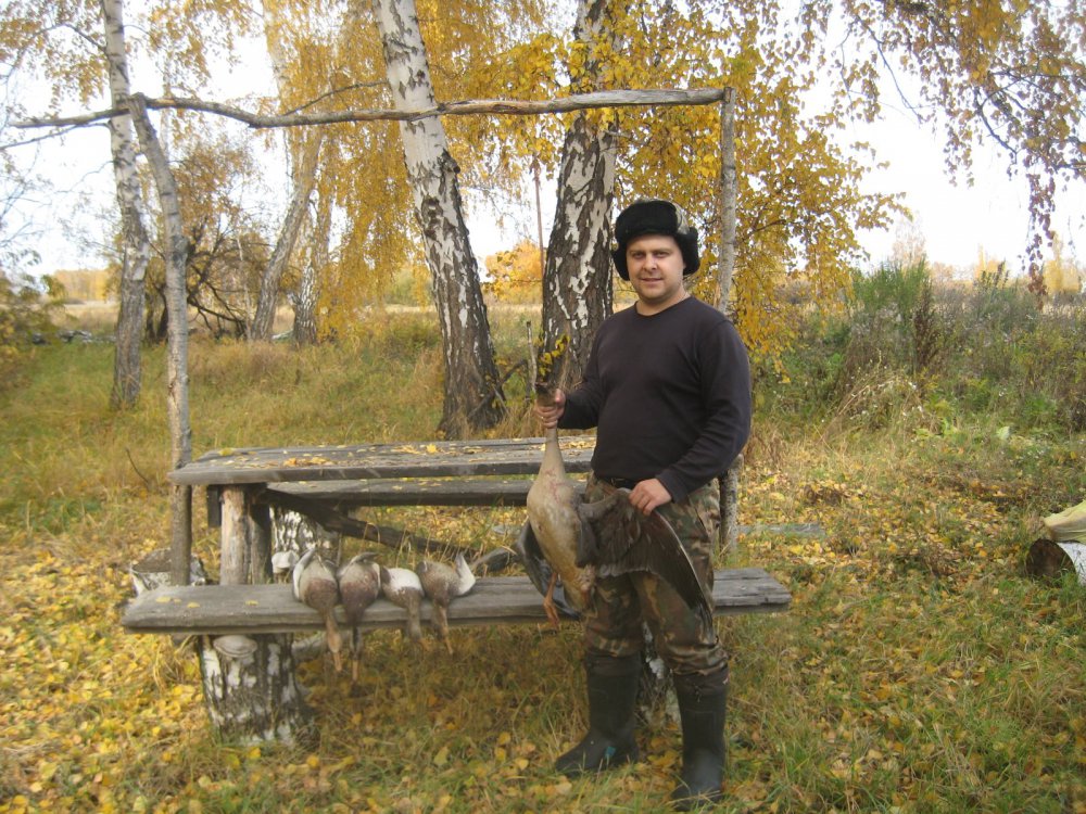 С трофеями.