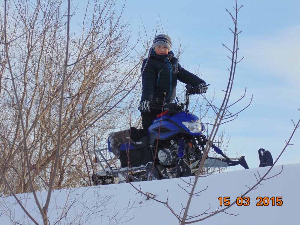 юный снегоходчик