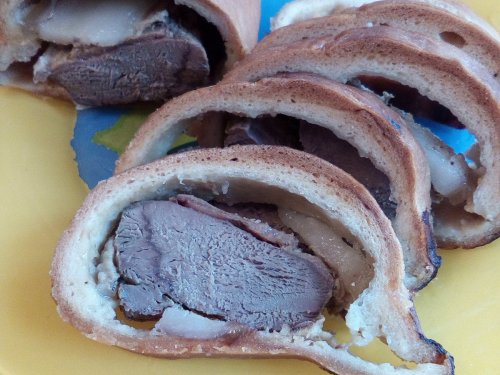 Куропатка под свининой....