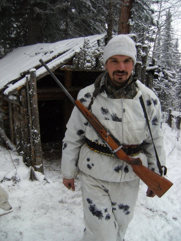 У избушки.