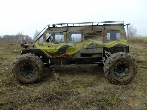 В полях -